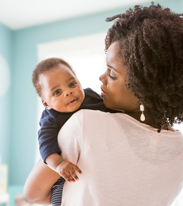 a mom and baby snuggling in a list of "K" boy names