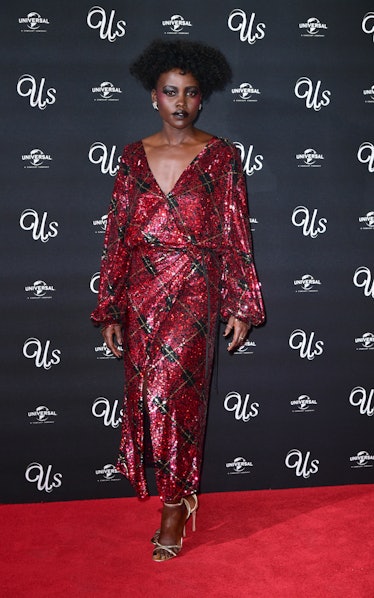 Lupita Nyong'o attending an exclusive screening of Us, Mr Peele's new film, 