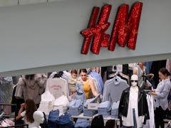 Shoppers enjoying H&M's Black Friday deals including up to 70% off.