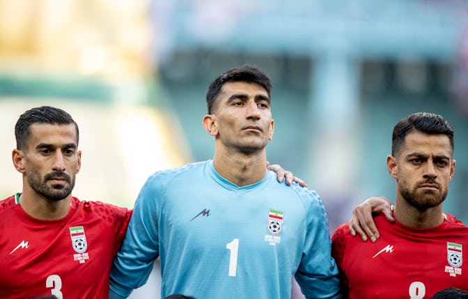 DOHA, QATAR - NOVEMBER 21: Iran players Ehsan Hajsafi, Alireza Beiranvand and Morteza Pouraliganji d...