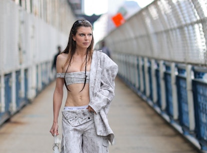 Before constructing a leaf "dress," Julia Fox walked around New York City in a gray crop top and low...