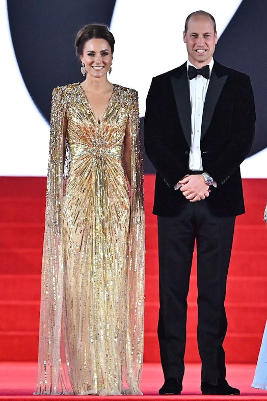 Kate Middleton wearing a gold sequin cape gown from Jenny Packham.