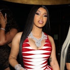 Cardi B at a party, where she would serve the best holiday drink recipe she shared on TikTok. 