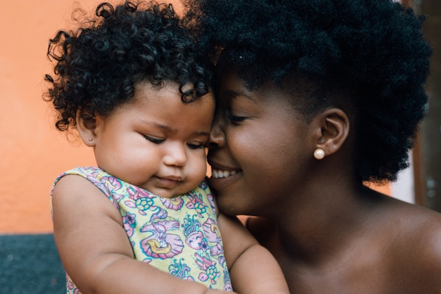 a snuggling mother and baby girl in a list of baby girl names that start with L