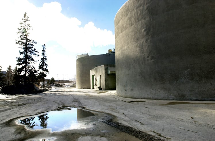 Staff Photo by Doug Jones, Thursday, February 6, 2003: Huge slurry vats contain the mixture that's p...