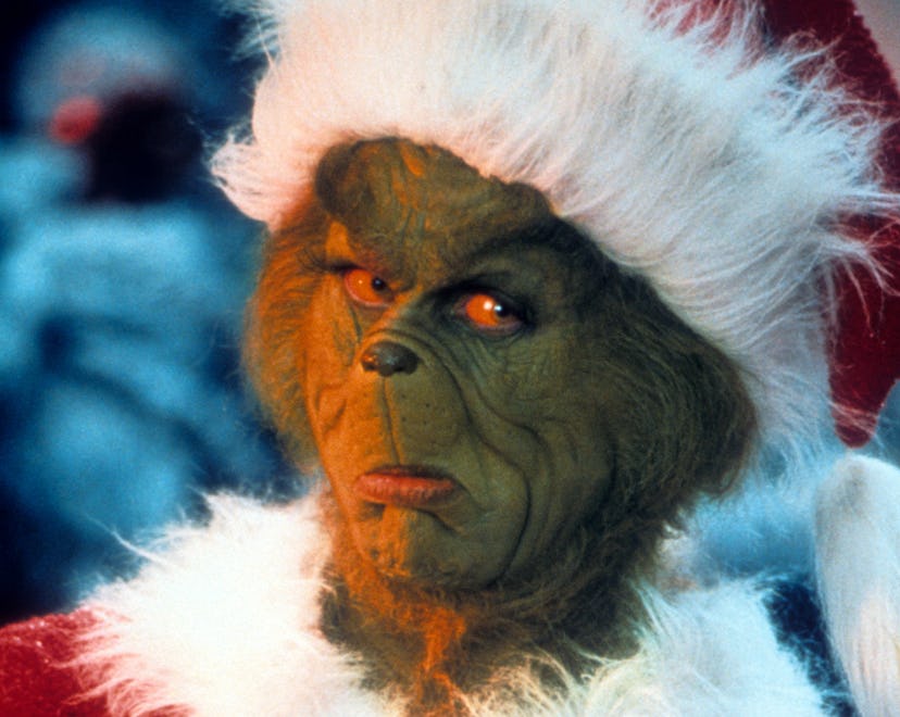 Jim Carrey with arms crossed in a scene from the film 'How The Grinch Stole Christmas', 2000. (Photo...