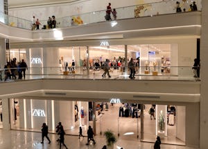 People shopping at Zara, a fashion brand having a pre-Black Friday 2022 sale.