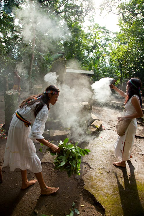 Temazcal sweat lodge purification ceremony with obelisk showing calendaric representation of solar s...