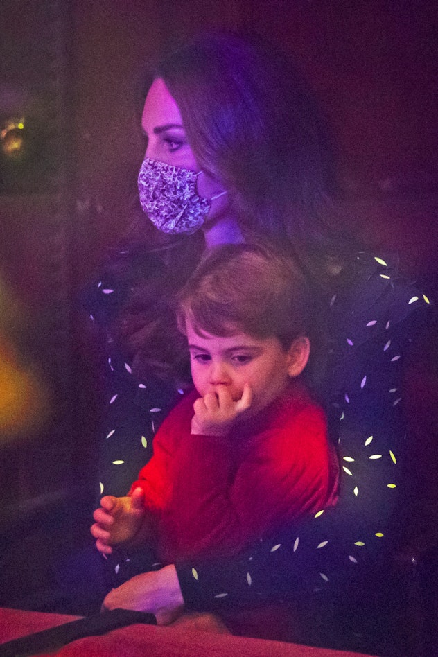 Prince Louis wore a cute red sweater.