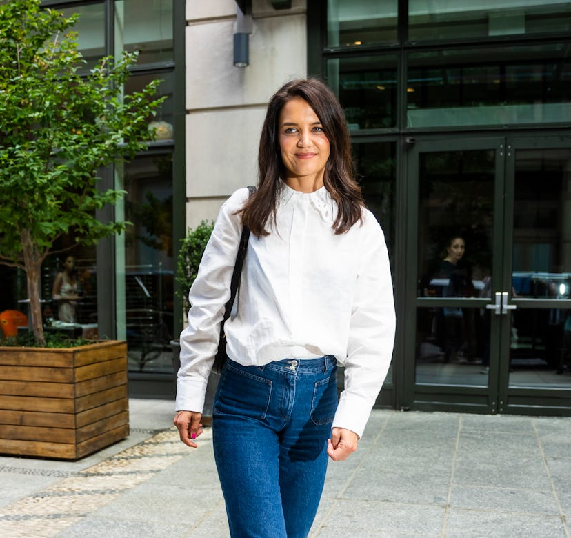 Katie Holmes wearing beige Chloé Nama sneakers.