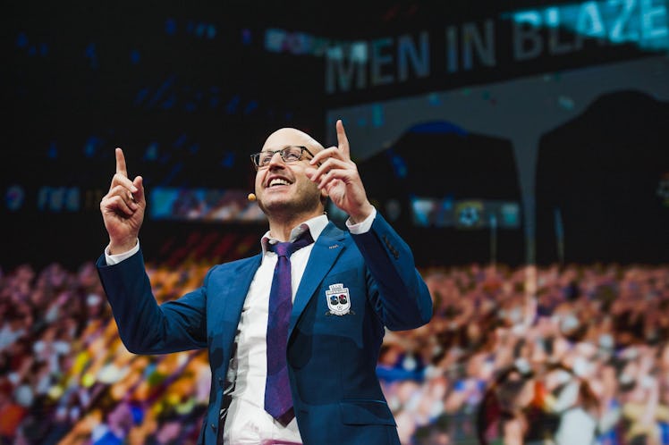Roger Bennett, co-host of the soccer podcast Men in Blazers, introduces the video game FIFA 18 at th...