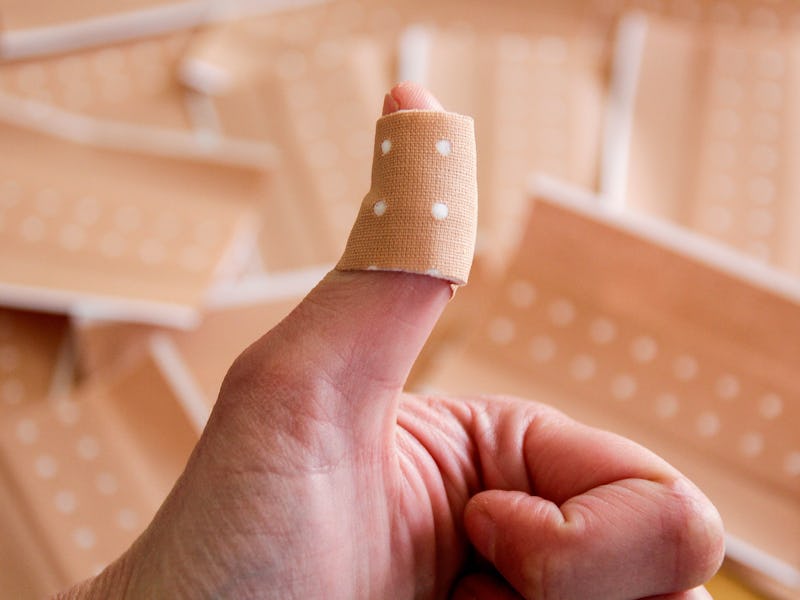 OK gesture, plaster, injured finger