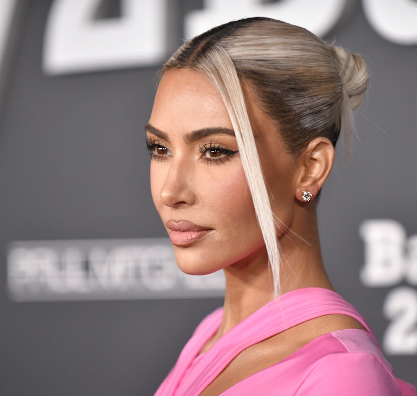 Kim Kardashian wearing a Balenciaga dress at the 2022 Baby2Baby Gala, two weeks before speaking out ...