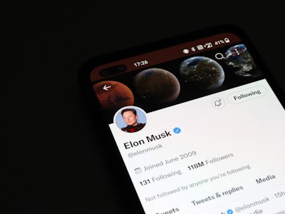 NEWCASTLE-UNDER-LYME, ENGLAND - NOVEMBER 21: The Twitter account of Elon Musk is displayed on a smar...