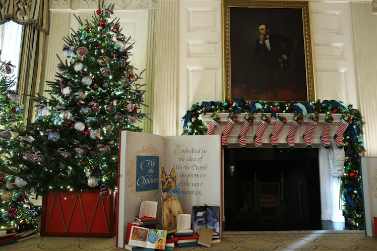 Christmas decoration that features first dog Commander is seen in the State Dining Room of the White...