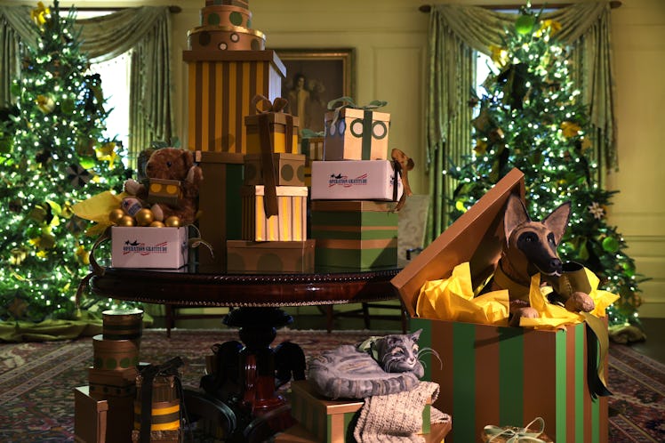 Christmas decorations featuring the Biden family's pets, Commander and Willow, are displayed in the ...