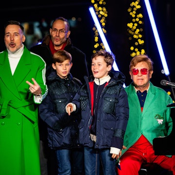 David Furnish and Sir Elton John at the opening ceremony for Saks Fifth Avenue's Holiday Windows and...
