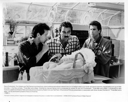 ( L-R) Steve Guttenberg, Tom Selleck and Ted Danson keep quiet as the baby sleeps in a scene from th...