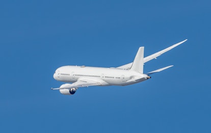 The commercial airplane is taking off Osaka International Airport.