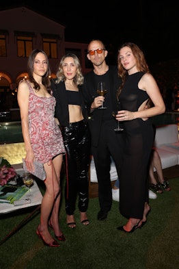 MIAMI BEACH, FLORIDA - NOVEMBER 28: Pari Ehsan, Angela Fink, Nick Hudson and Madelynn Furlong Hudson...