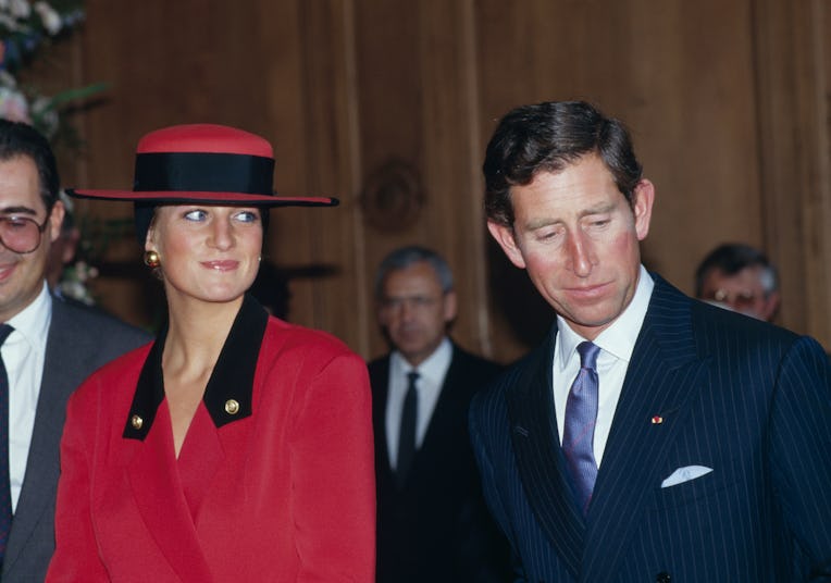 Prince Charles, Prince of Wales and Princess Diana, Princess of Wales (1961-1997), wearing a red jac...
