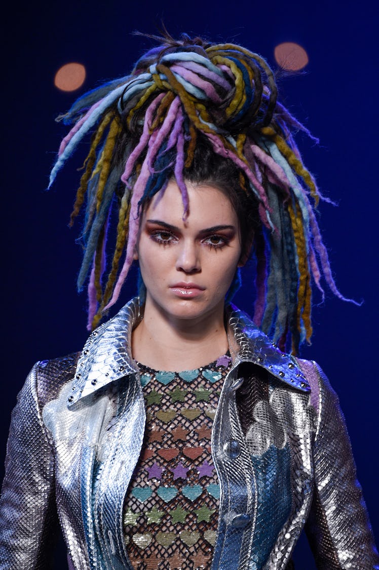 Kendall Jenner Beauty Evolution: Kendall Jenner, with colorful locs, walks the runway at the Marc Ja...
