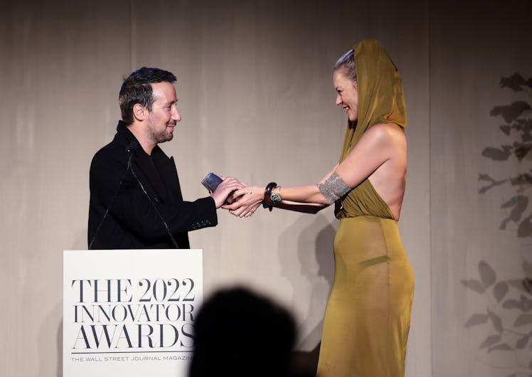Anthony Vaccarello and Kate Moss onstage at the WSJ. Magazine 2022 Innovator Awards