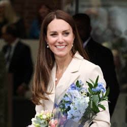 Kate Middleton wearing a beige midi dress from Self-Portrait.
