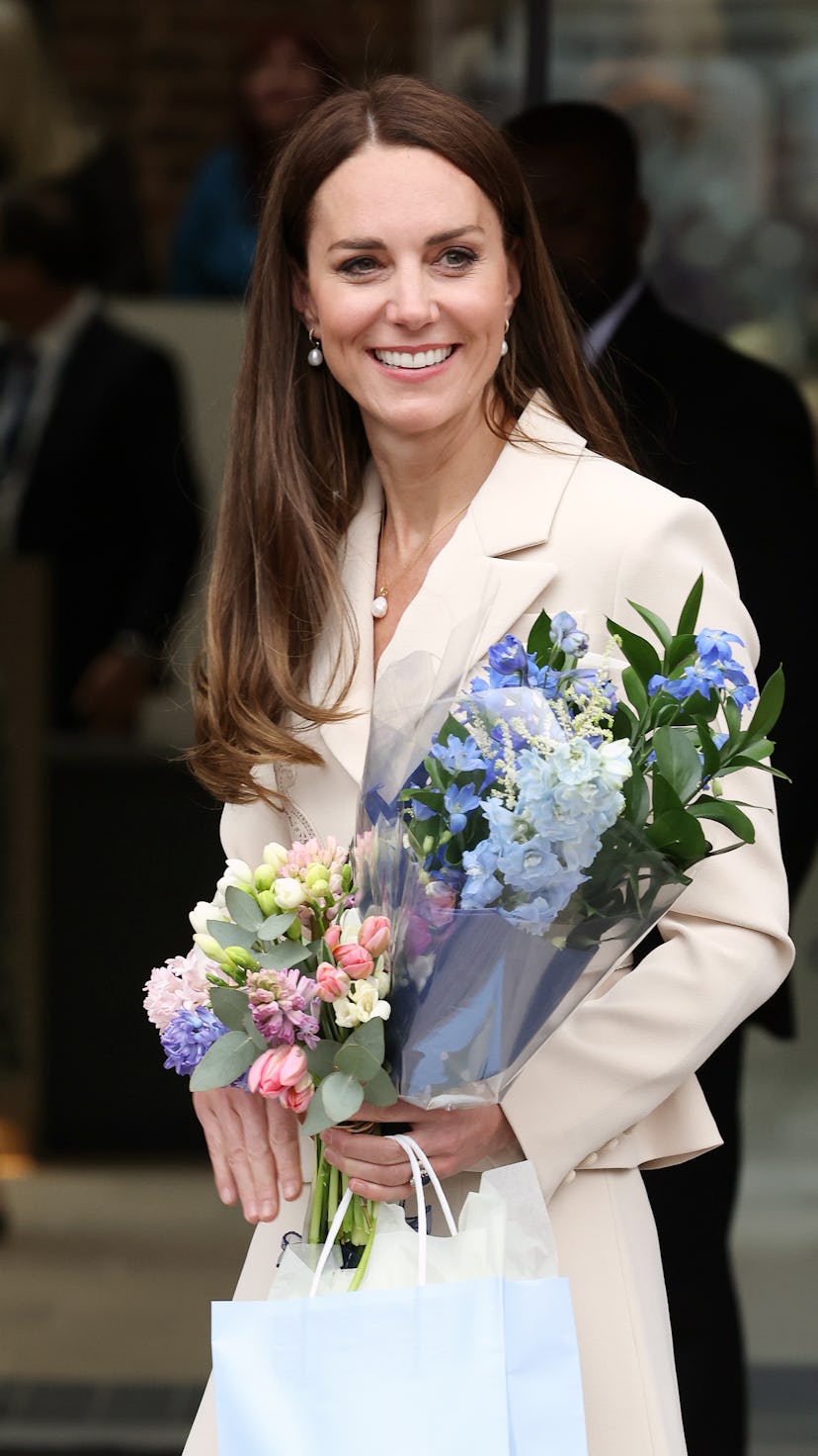 Kate Middleton wearing a beige midi dress from Self-Portrait.