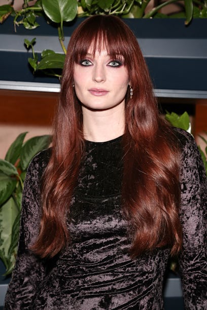 Sophie Turner with red hair, the 2022 winter hair trend for Aries, attends as Glamour celebrates the...