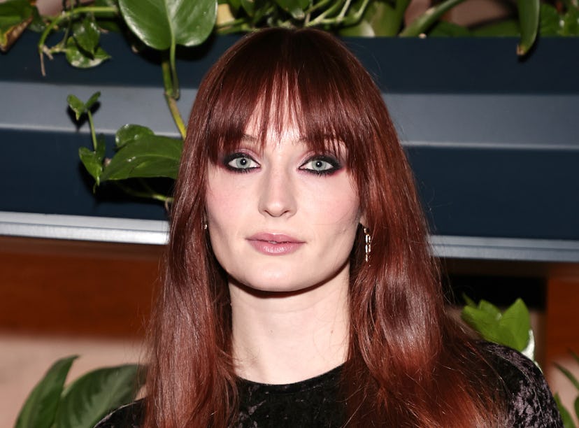 Sophie Turner with red hair, the 2022 winter hair trend for Aries, attends as Glamour celebrates the...
