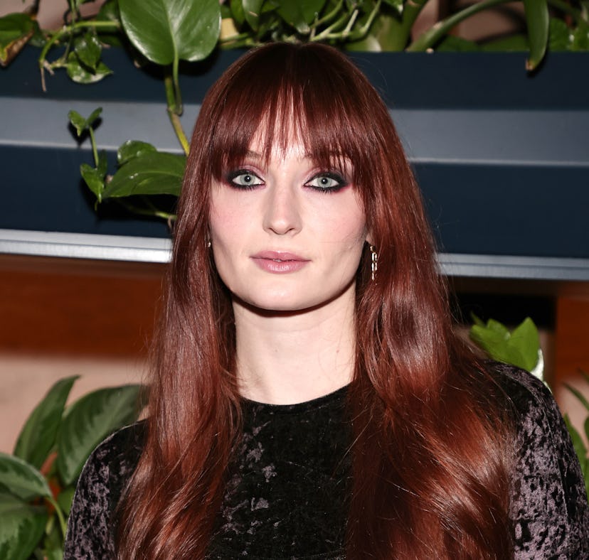 Sophie Turner with red hair, the 2022 winter hair trend for Aries, attends as Glamour celebrates the...