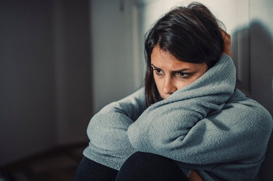 Close up of young woman struggling from mental breakdown