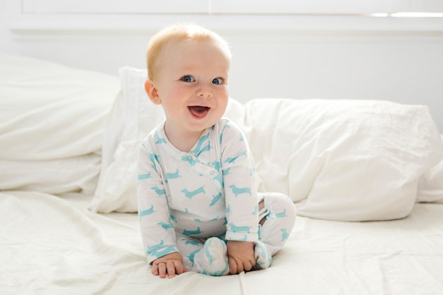 Smiling baby boy in article about boy names that start with N