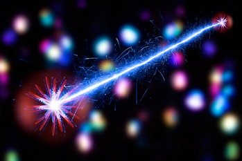 Quantum entanglement.  Conceptual artwork of a pair of entangled particles or quantum events (left and right).