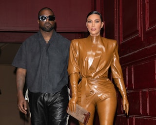 Kim Kardashian and husband Kanye West finalized their divorce. Here, they leave K.West's Sunday Serv...