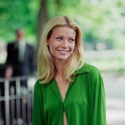 Gwyneth Paltrow wearing a green top and skirt in the '90s.