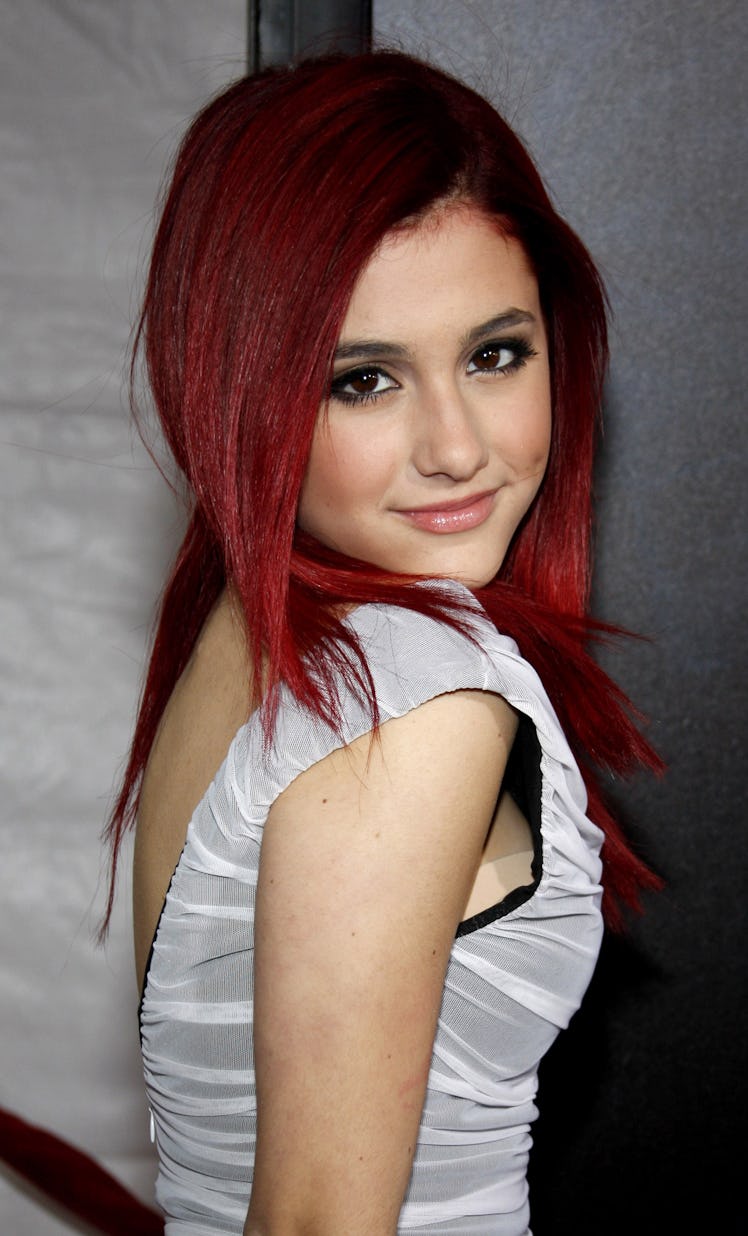 Ariana Grande's beauty evolution includes Ariana Grande with short red hair.