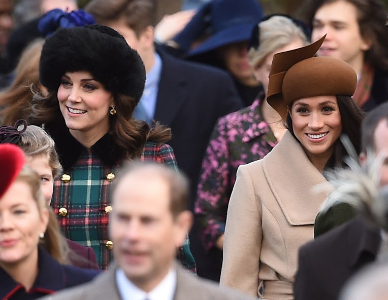 The Duchess of Cambridge (left) and Meghan Markle arriving to attend the Christmas Day morning churc...