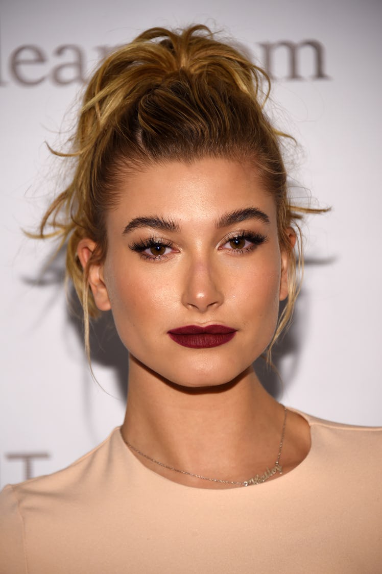 Hailey Bieber's Beauty Evolution: Hailey Baldwin with vampy lipstick arrives at the 7th Annual "Nigh...