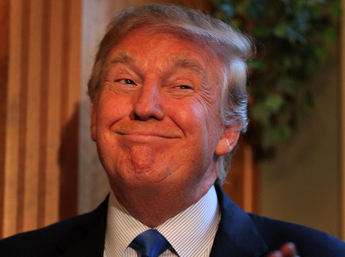 031915 Amherst, NH) Donald Trump, possible presidential candidate in 2016, smiles as he is introduce...