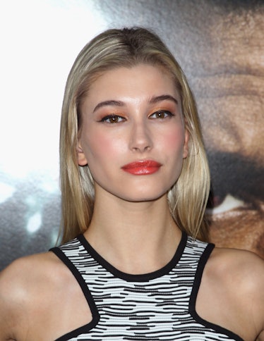 Hailey Bieber's Beauty Evolution: Hailey Baldwin with thick eyebrows attends the "After Earth" premi...