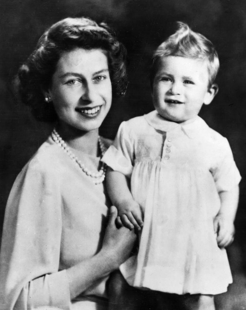 Queen Elizabeth with King Charles as a baby.