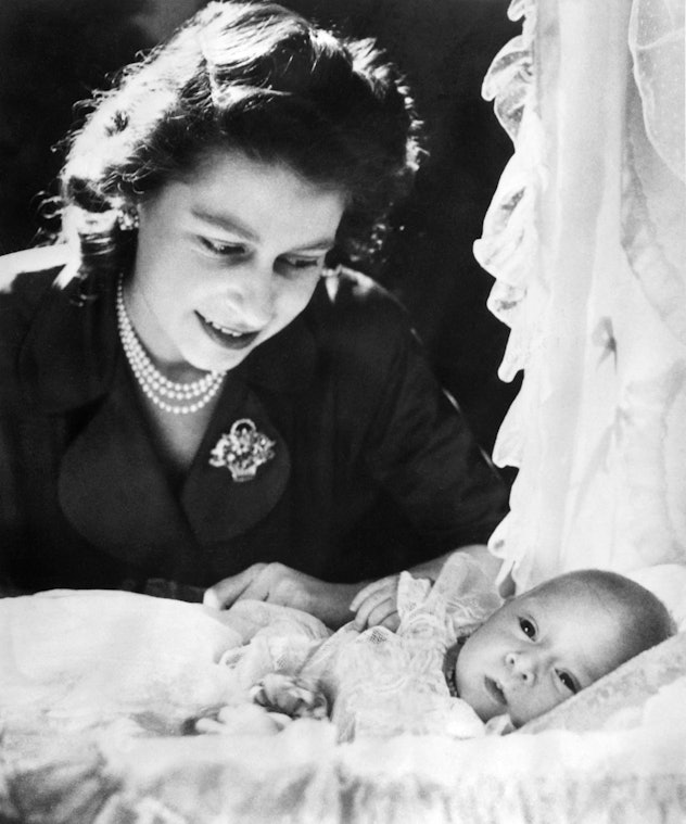 Queen Elizabeth with King Charles as a baby.