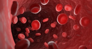 Red blood cells in a human artery, illustration.