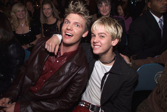 Nick Carter and his little brother Aaron Carter seated in the audience during the 2000 Billboard Mus...