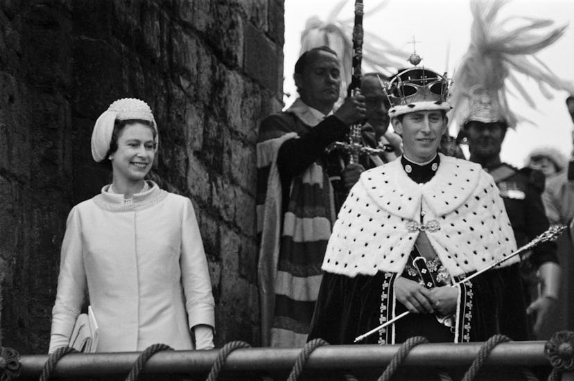Queen Elizabeth crowns her son the Prince of Wales.