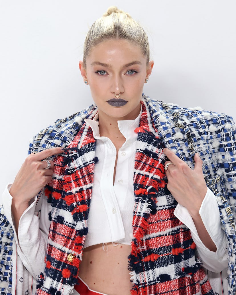 Gigi Hadid attended the 2022 CFDA Awards with grey lipstick and a (potentially faux) septum nose rin...