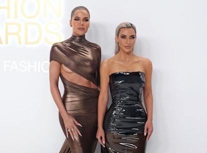 Khloe Kardashian and Kim Kardashian, with balletcore manicures, attend the 2022 CFDA Awards at Casa ...
