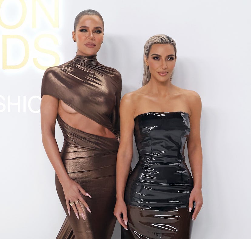 Khloe Kardashian and Kim Kardashian, with balletcore manicures, attend the 2022 CFDA Awards at Casa ...
